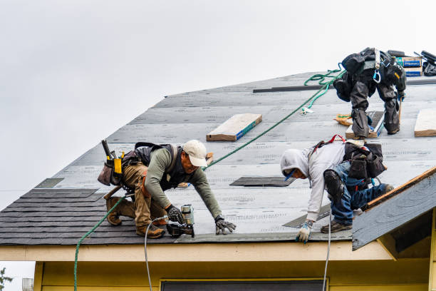 Professional Gutter Installation technician working in Ocean Grove, MA